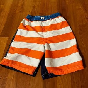 iXtreme Boys' small Swim Trunks/ Quick
Dry Board Shorts with Mesh Lining